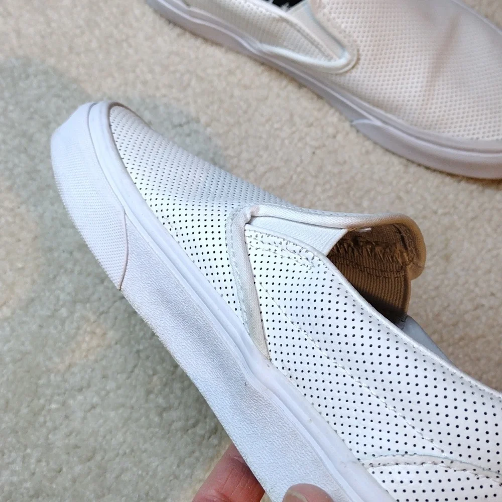 Vans men's white perforated leather slip on loafers. Size 5.5